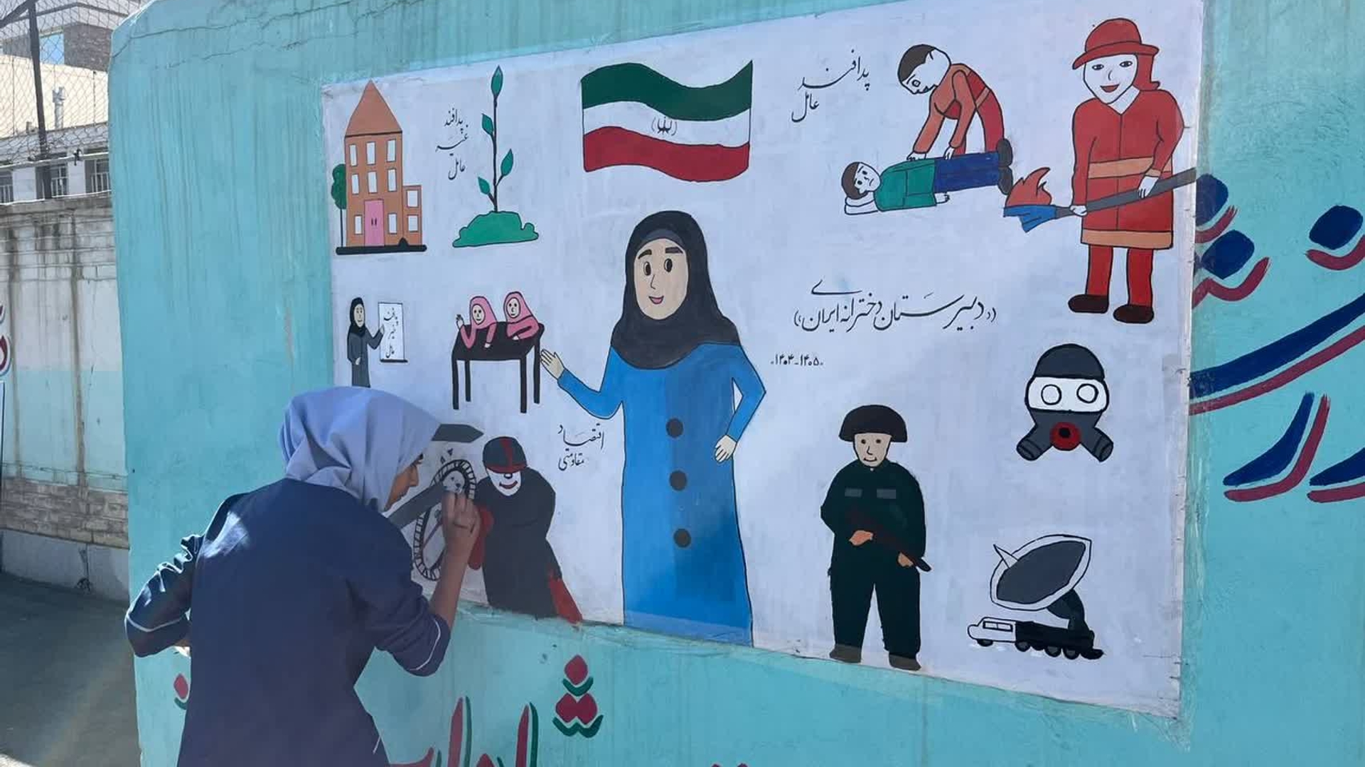 نواخته شدن زنگ پدافند غیرعامل در مدرسه دخترانه ایران با حضور مدیرکل پدافند غیرعامل استان مرکزی