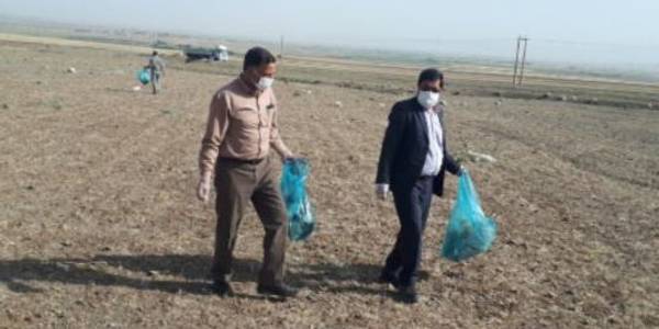 پاکسازی حاشیه محل دفن پسماند شهرستان خنداب
