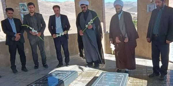 غبار روبی و ادای احترام به مقام شامخ شهیدان